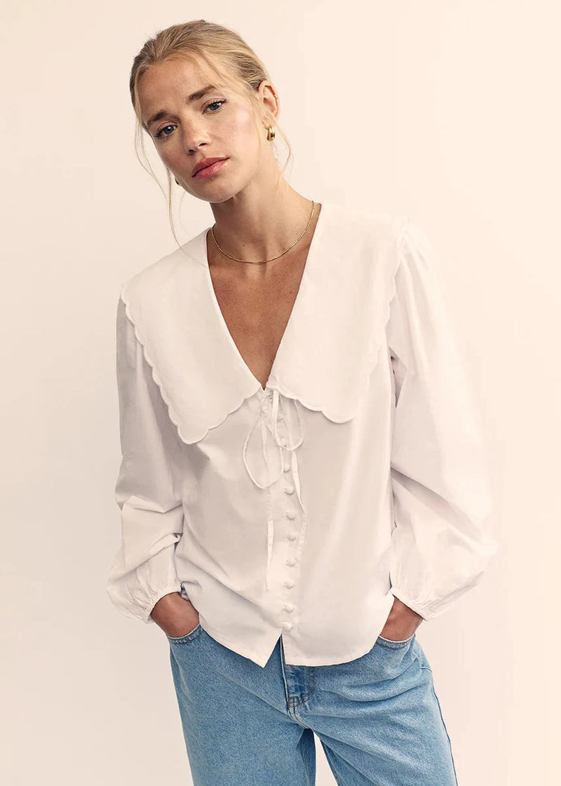 woman wearing Nobody's Child Birdie blouse (white) oversized collar