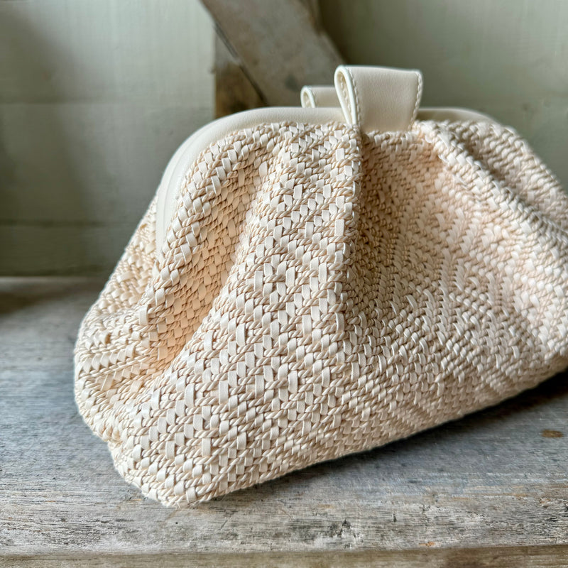 Neutral woven clutch bag