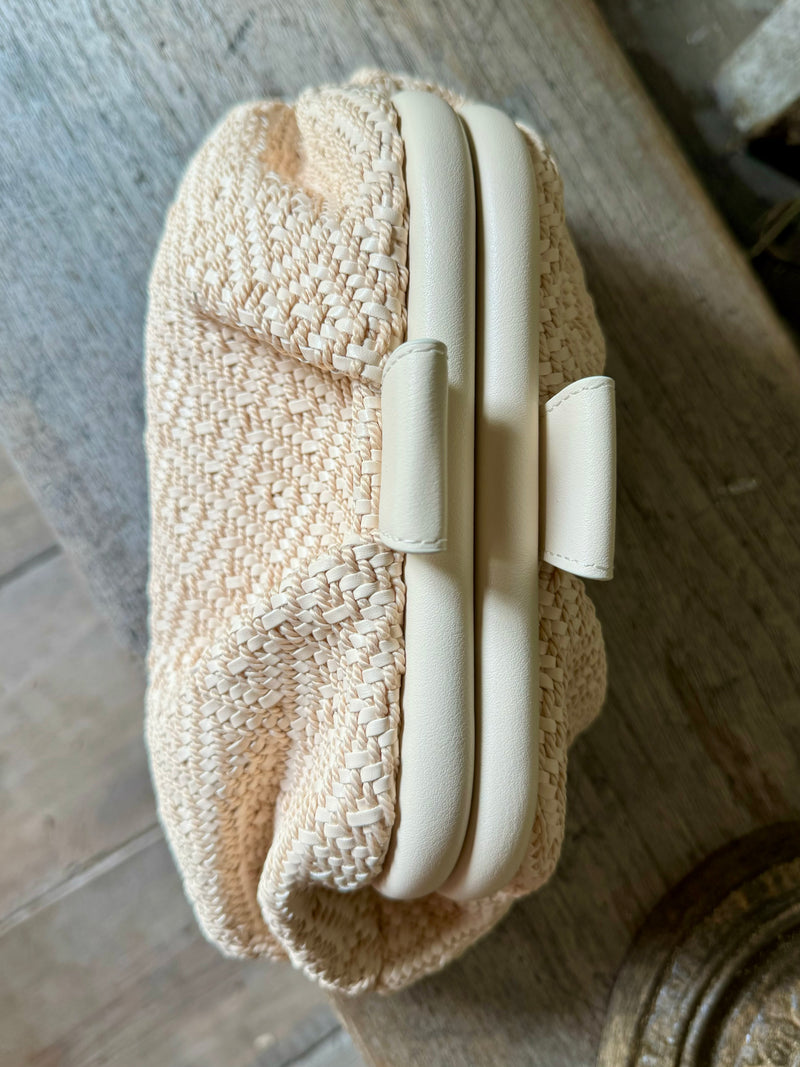 Neutral woven clutch bag