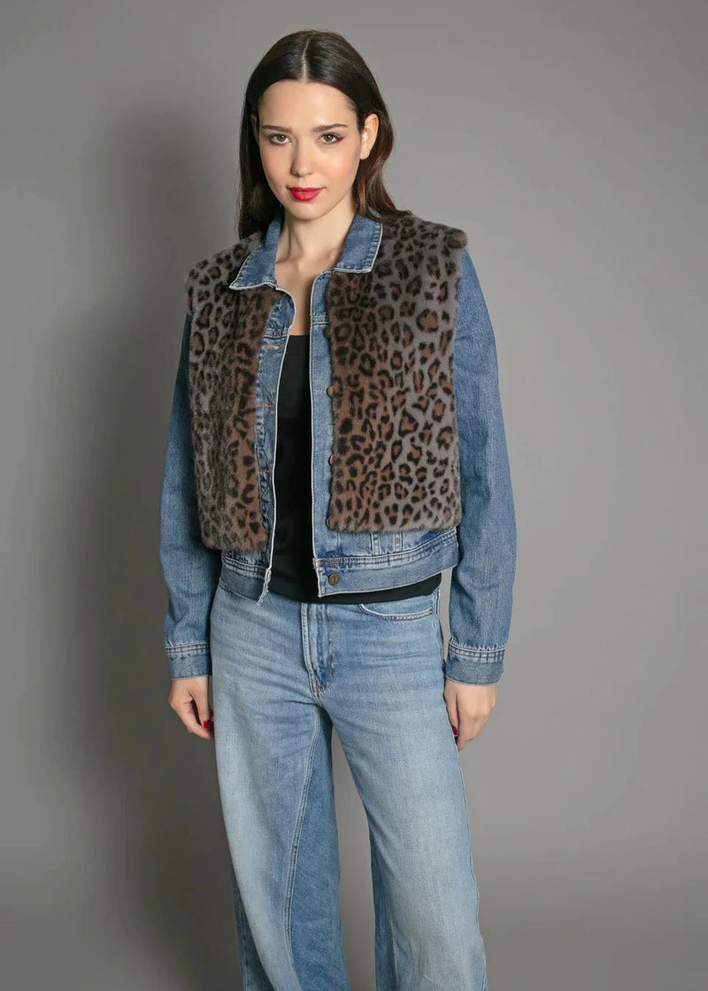 woman wearing NOOKI Edelweiss Gilet (Grey Leopard) a denim jacket with leopard print panels